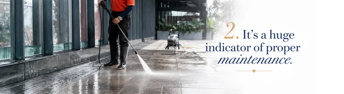 Graphic reading '2. It's a huge indicator of proper maintenance' over a photo of a driveway being pressure washed