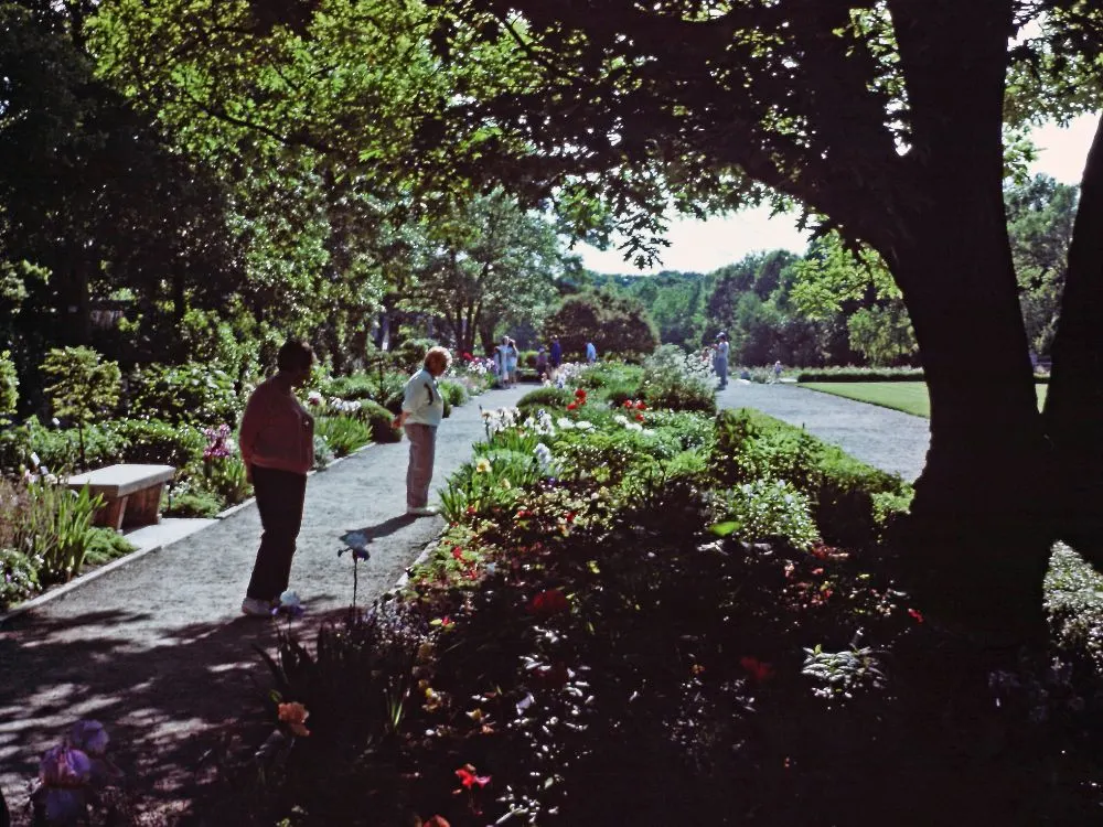 Visitors walking among flower beds at Boerner Botanical Gardens